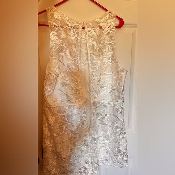 women’s white lace embroidered sleeveless romper - Picture 2 of 3